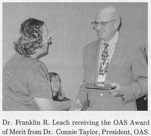 Photo of Dr. Franklin R. Leach receiving award